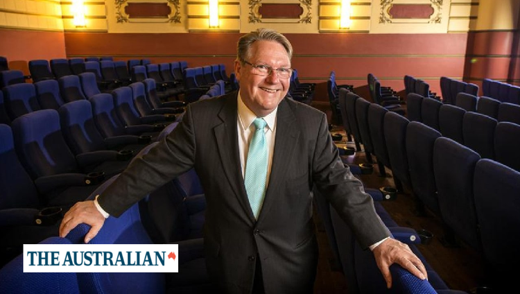 David Doepel standing in a theatre